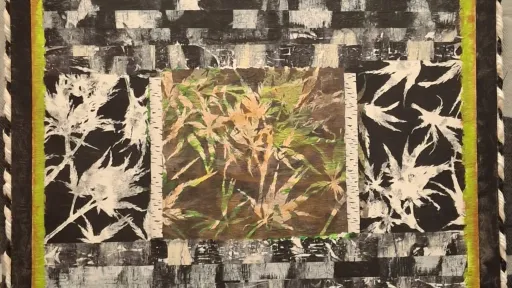 Textile art prints on rice paper showing abstract patterns, and a central artwork of golden wheat.