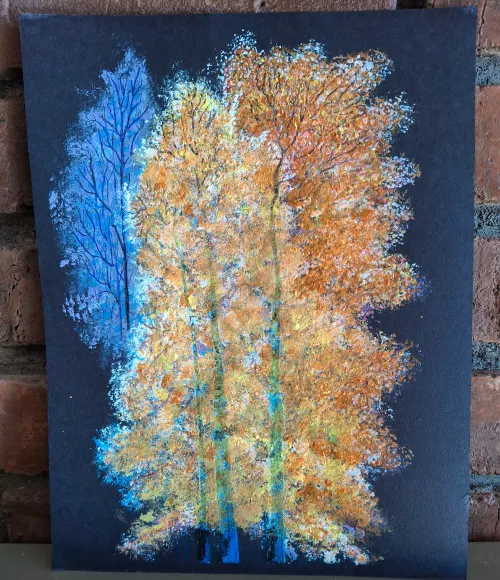 Acrylic and water color painting of tree transitions from blue to orange